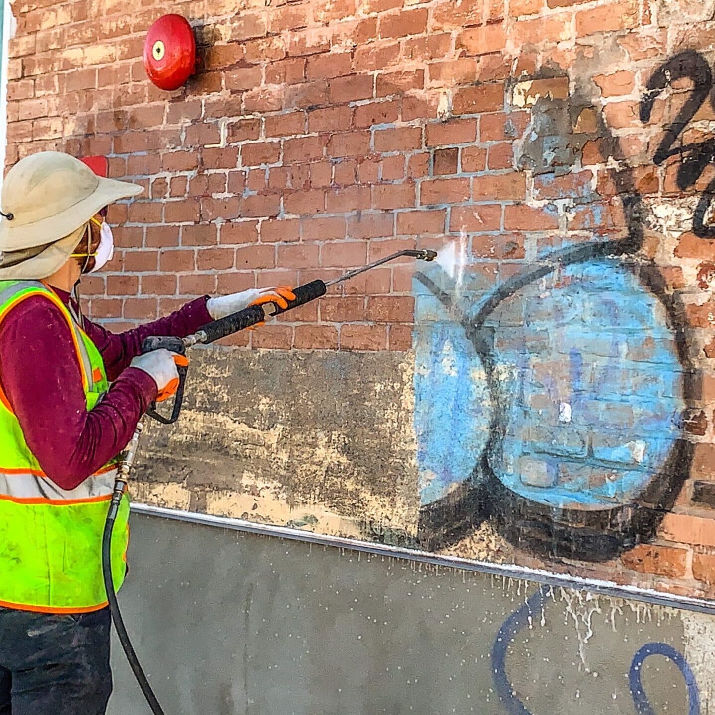 Professional graffiti removal services for buildings and surfaces